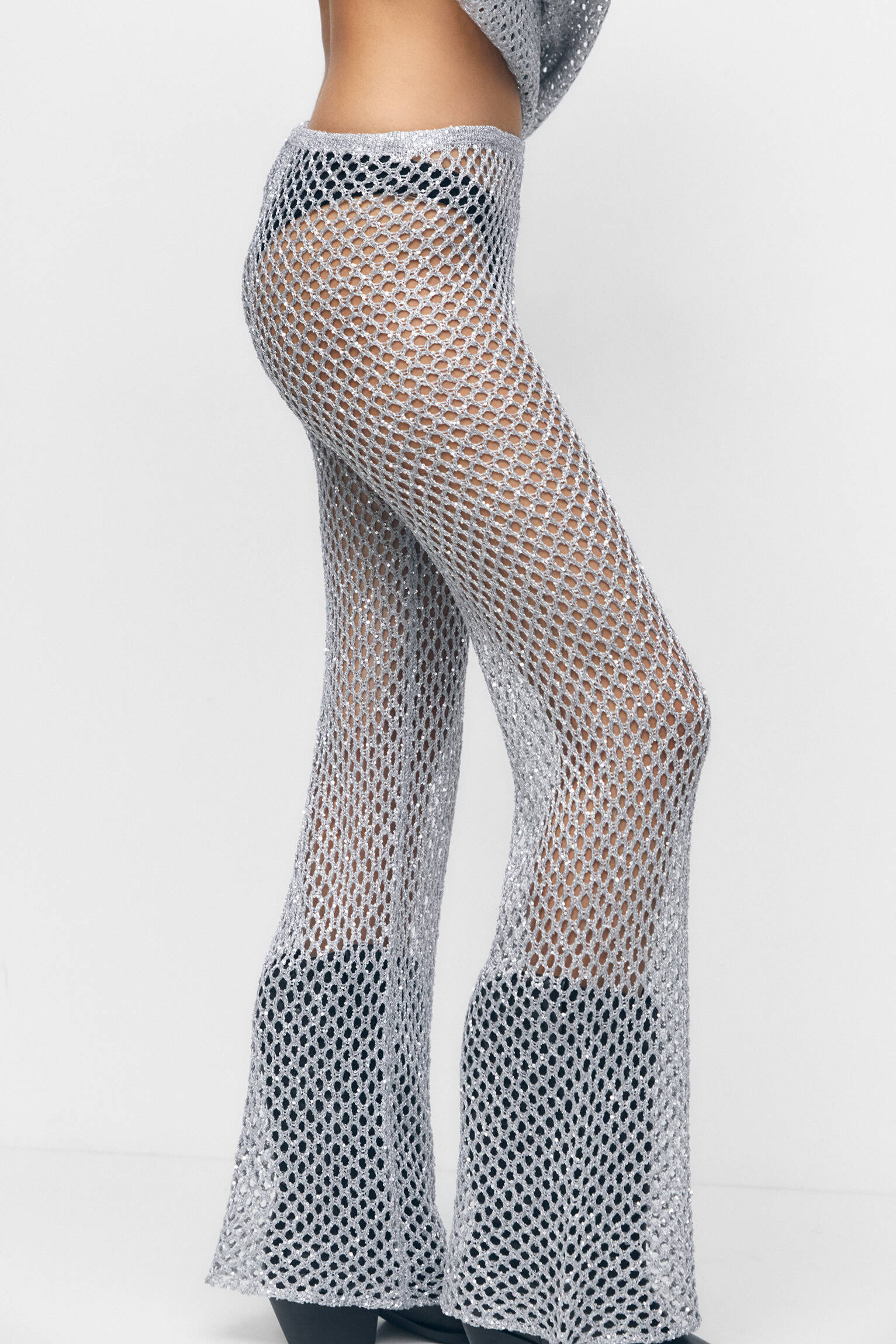 Calça de malha com lantejoulas - Prateada