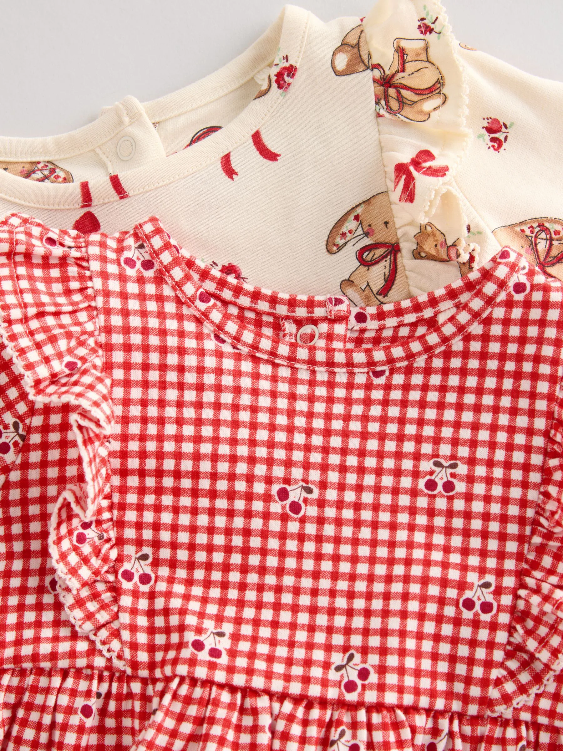 Crème beer/ rode kersen geruit - Verpakking van 2 jersey babyjurkjes (0 mnd-2 jr)