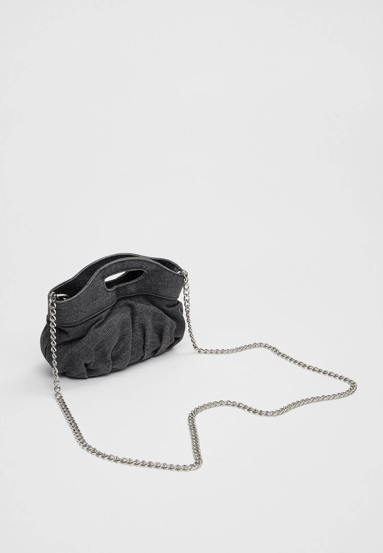 Mini bolsa jeans com alça