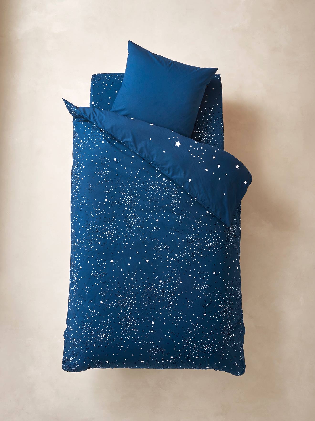 Conjunto de capa de edredom com detalhes fluorescentes + Fronha infantil Ours Polaire, lisa azul-escura com estampas.