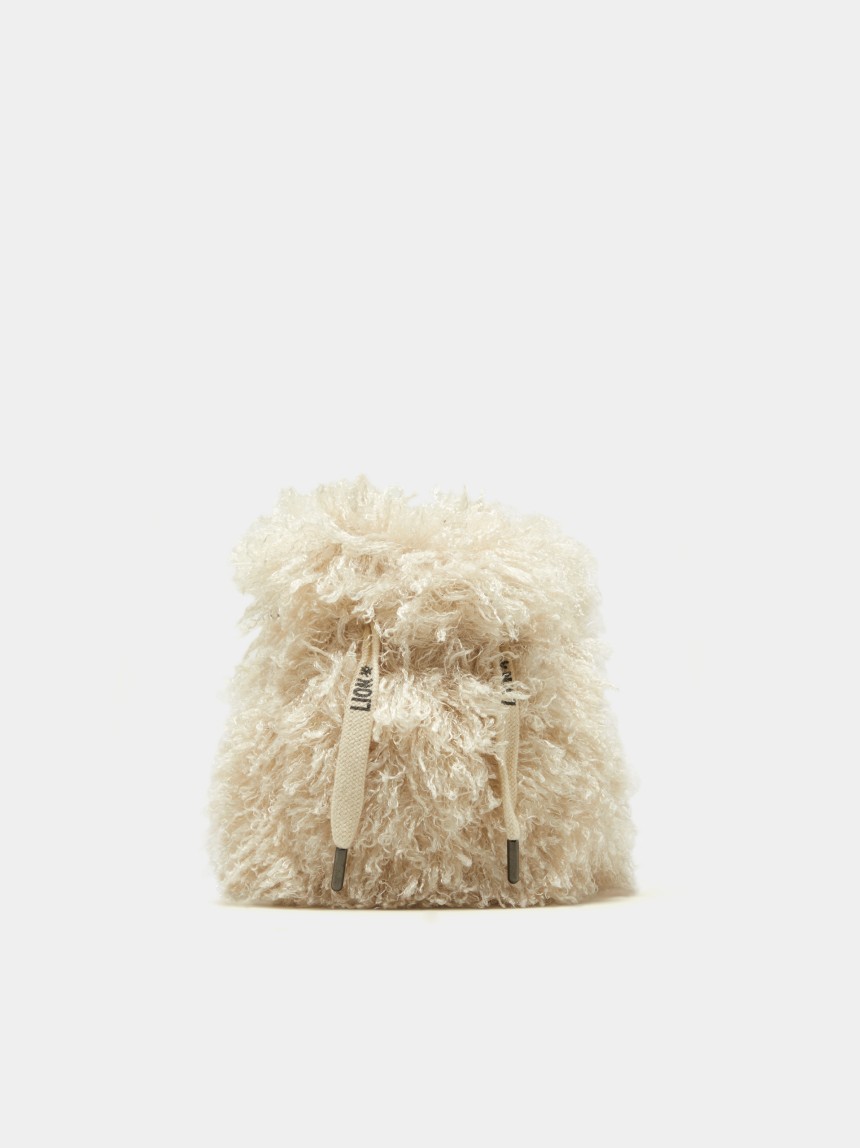 Bolsa em pêlo a tiracolo
