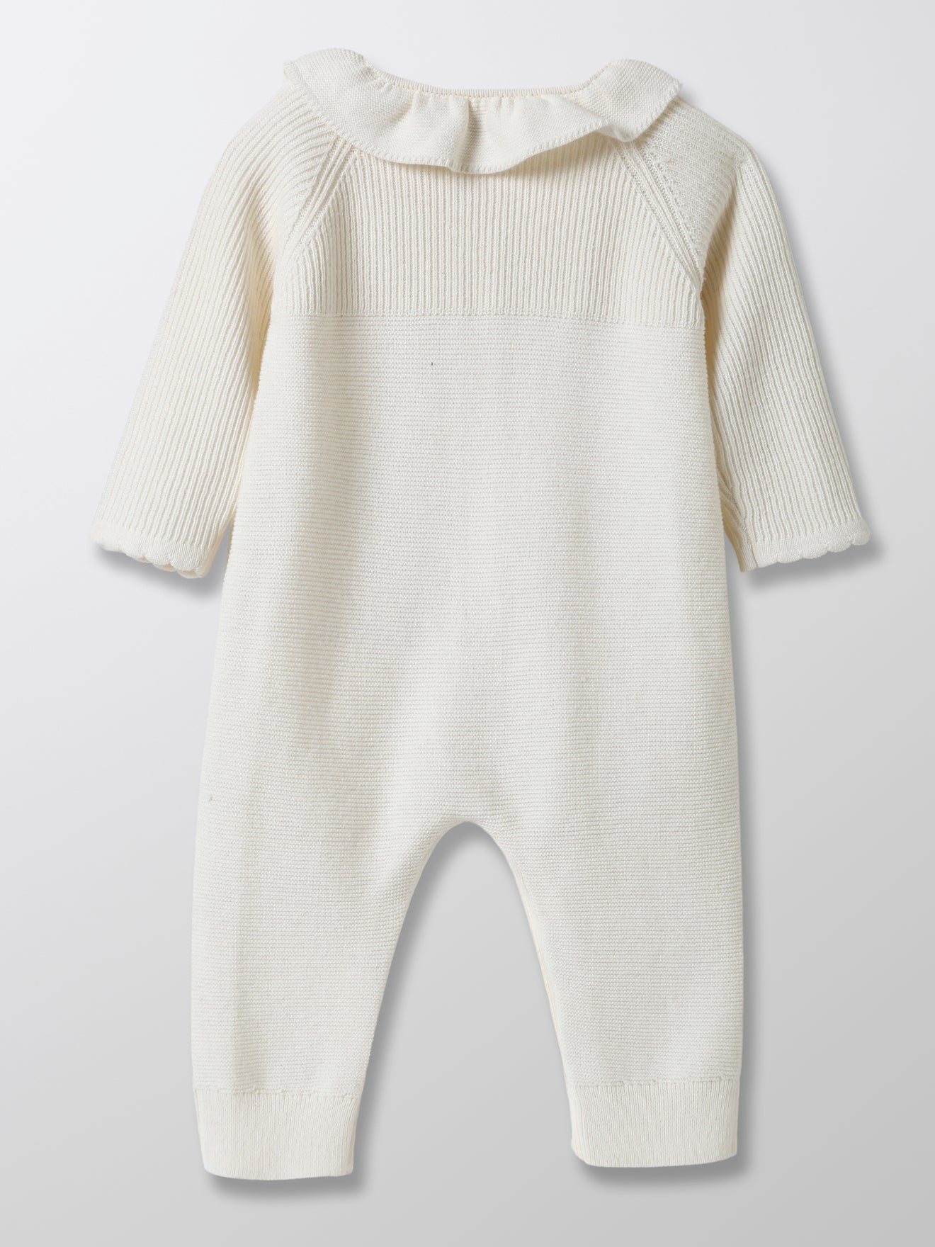 Combinaison bébé en tricot