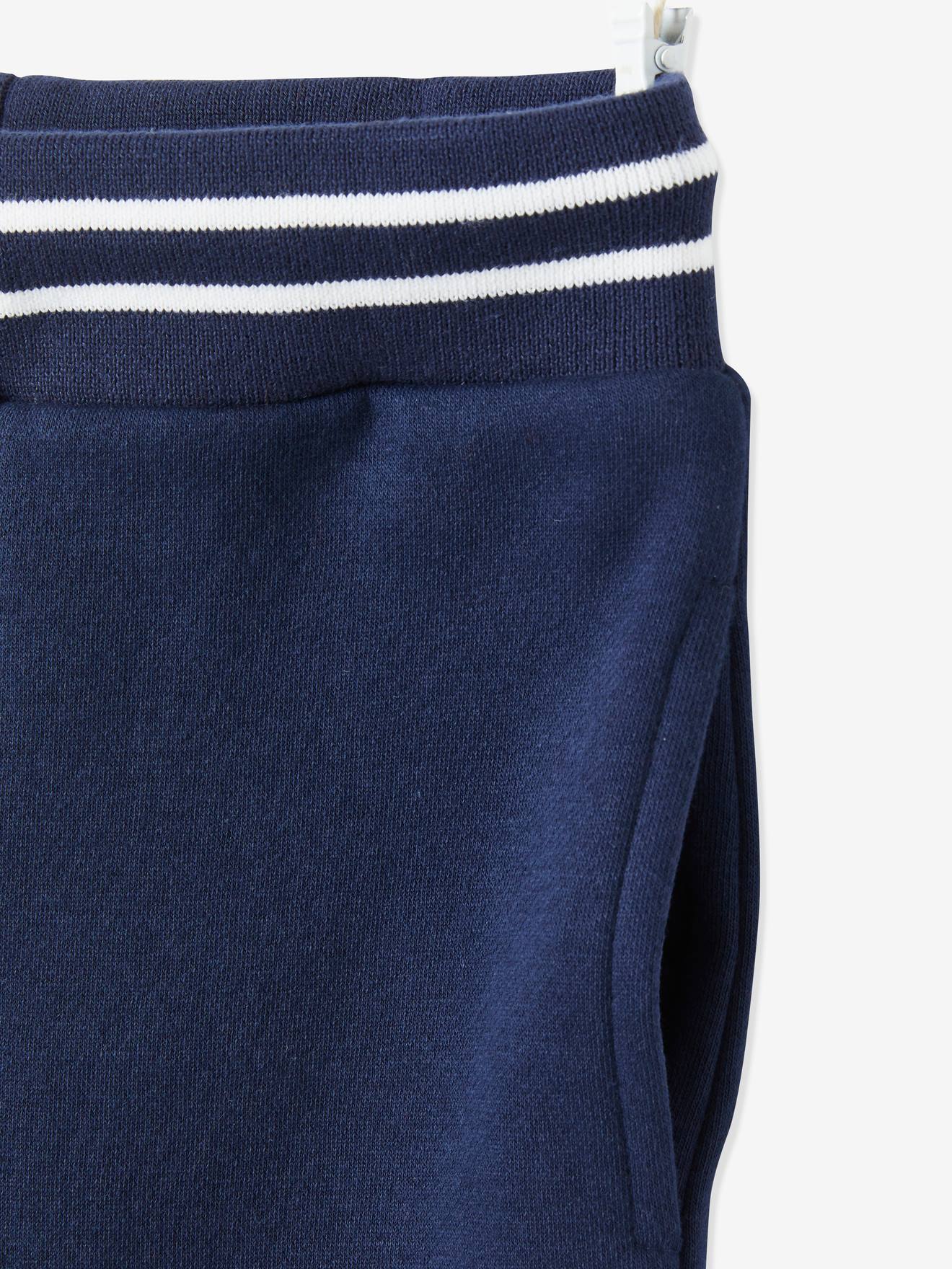 Calças de fato de treino lisas em lã polar azul-escura para meninos com estampas.