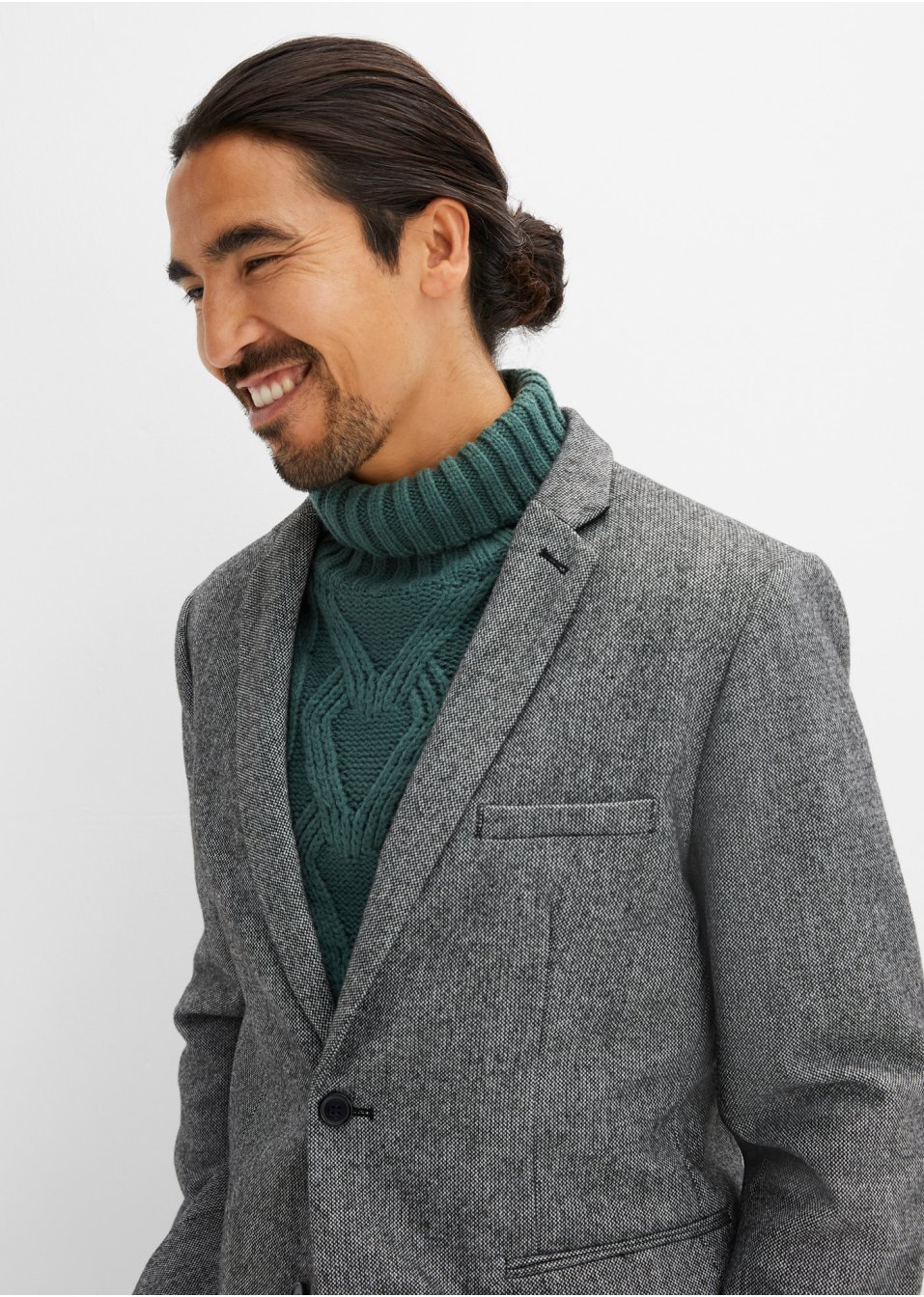 Pull col roulé à motif torsadé