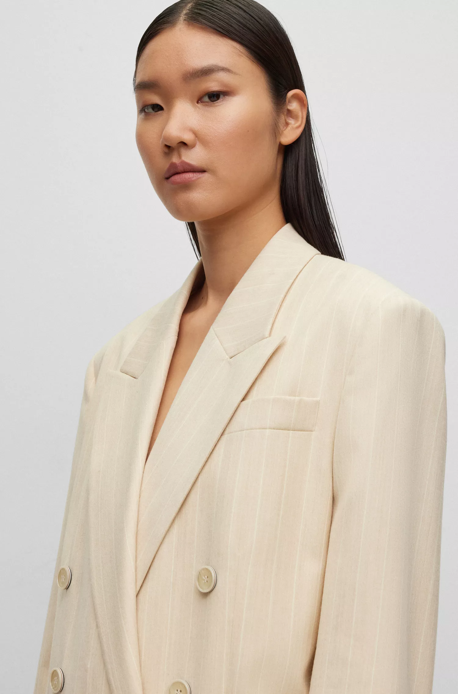 Jaqueta BOSS preta de modelagem oversized em flanela de lã elástica com risca de giz.