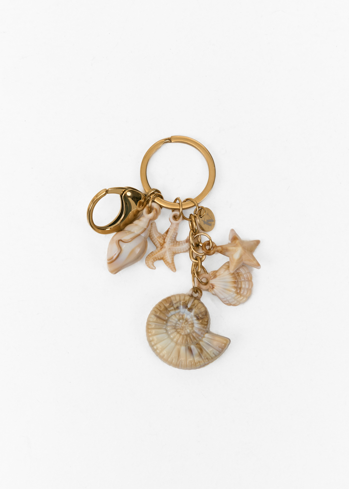Romy bag charm creme