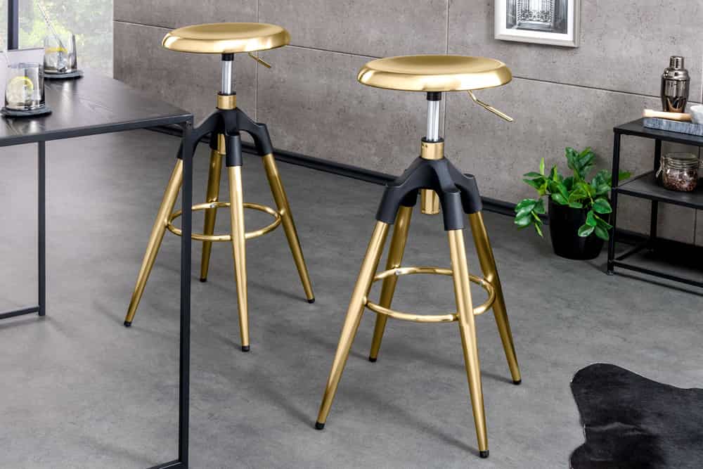 Höhenverstellbarer Barhocker INDUSTRIAL gold schwarz Metall rund drehbar Industrial Design