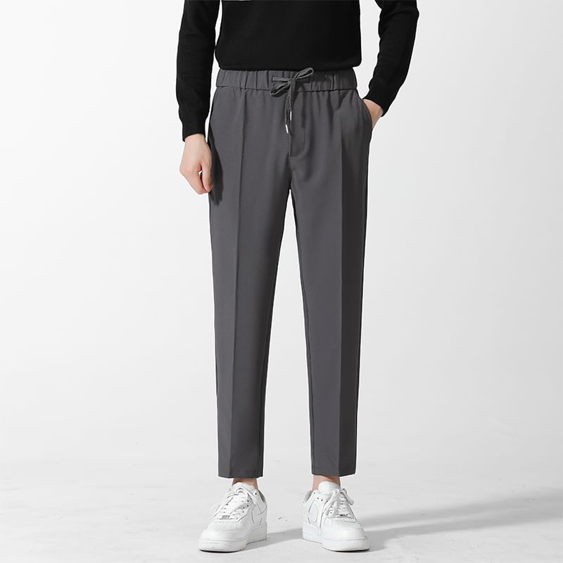 Loansk - Effen cropped, taps toelopende broek met trekkoord in de taille