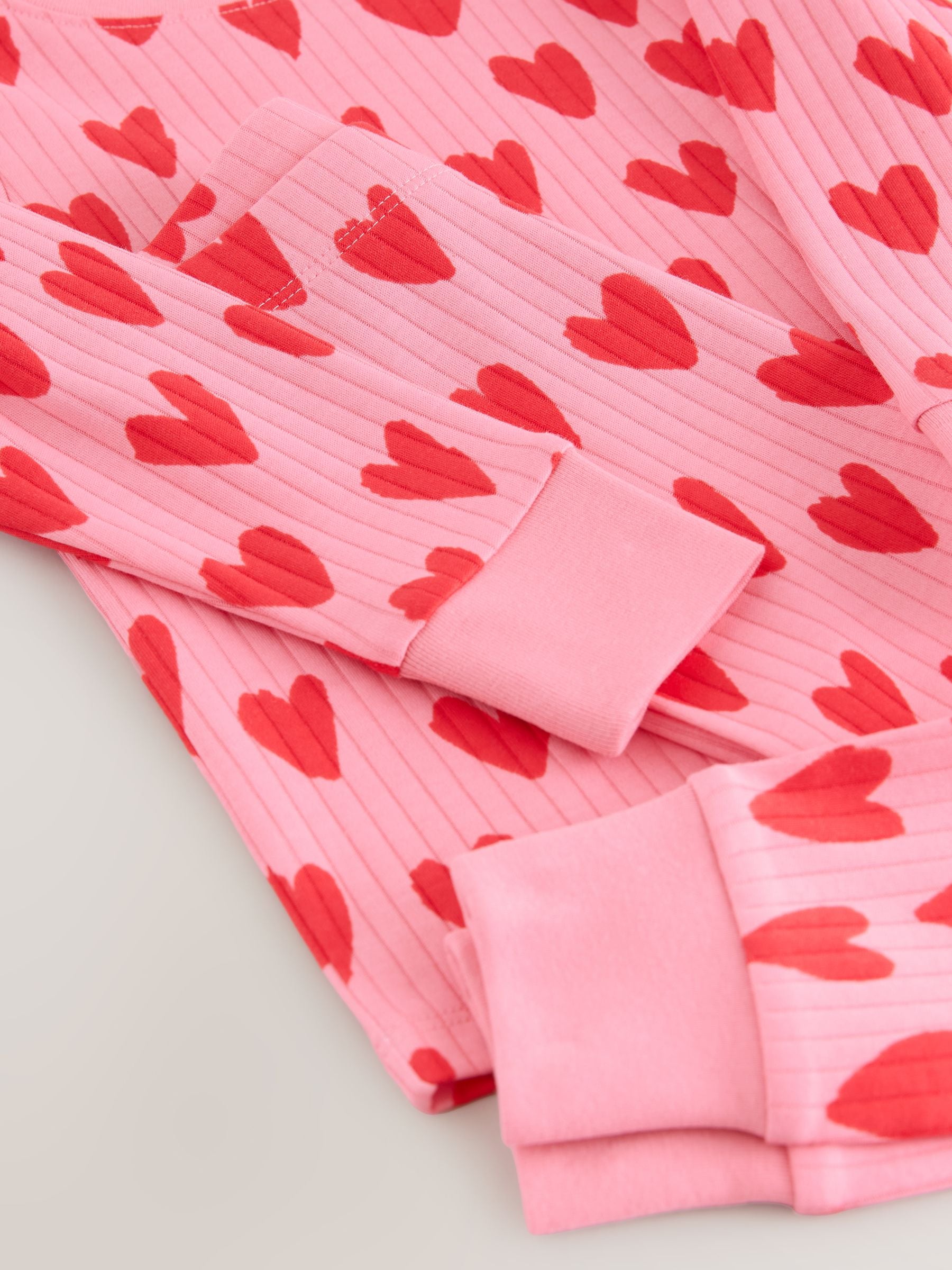 Rood/roze hartjes - Behaaglijke pyjama (9 mnd-10 jr)