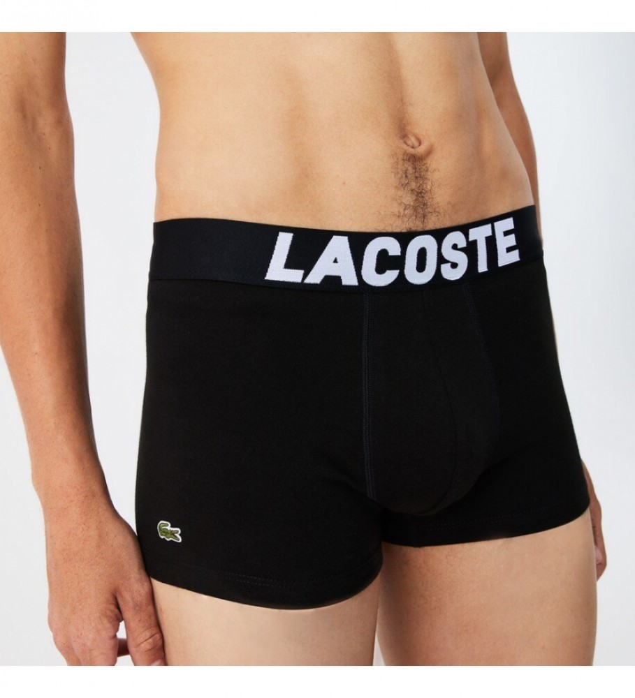 Conjunto de 3 cuecas Lacoste, nas cores branca, cinza e preta.