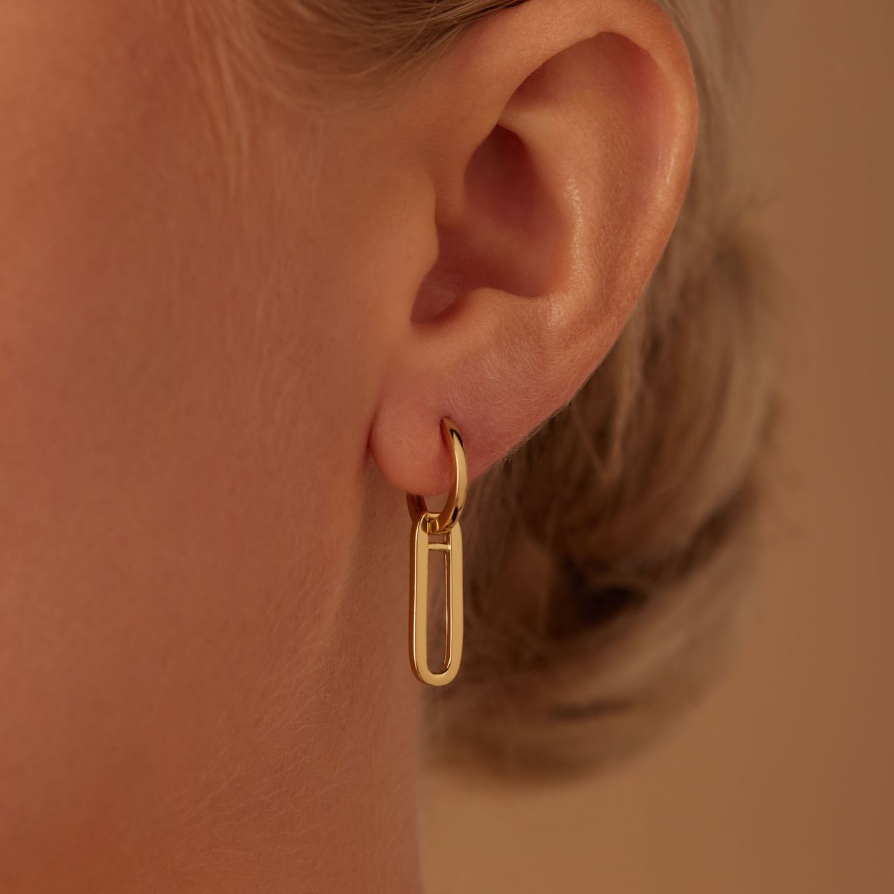 Zilveren goldplated oorringen met hanger ovaal