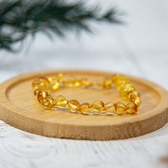 Bracelet Ambre bébé   Honey        de               Irréversible