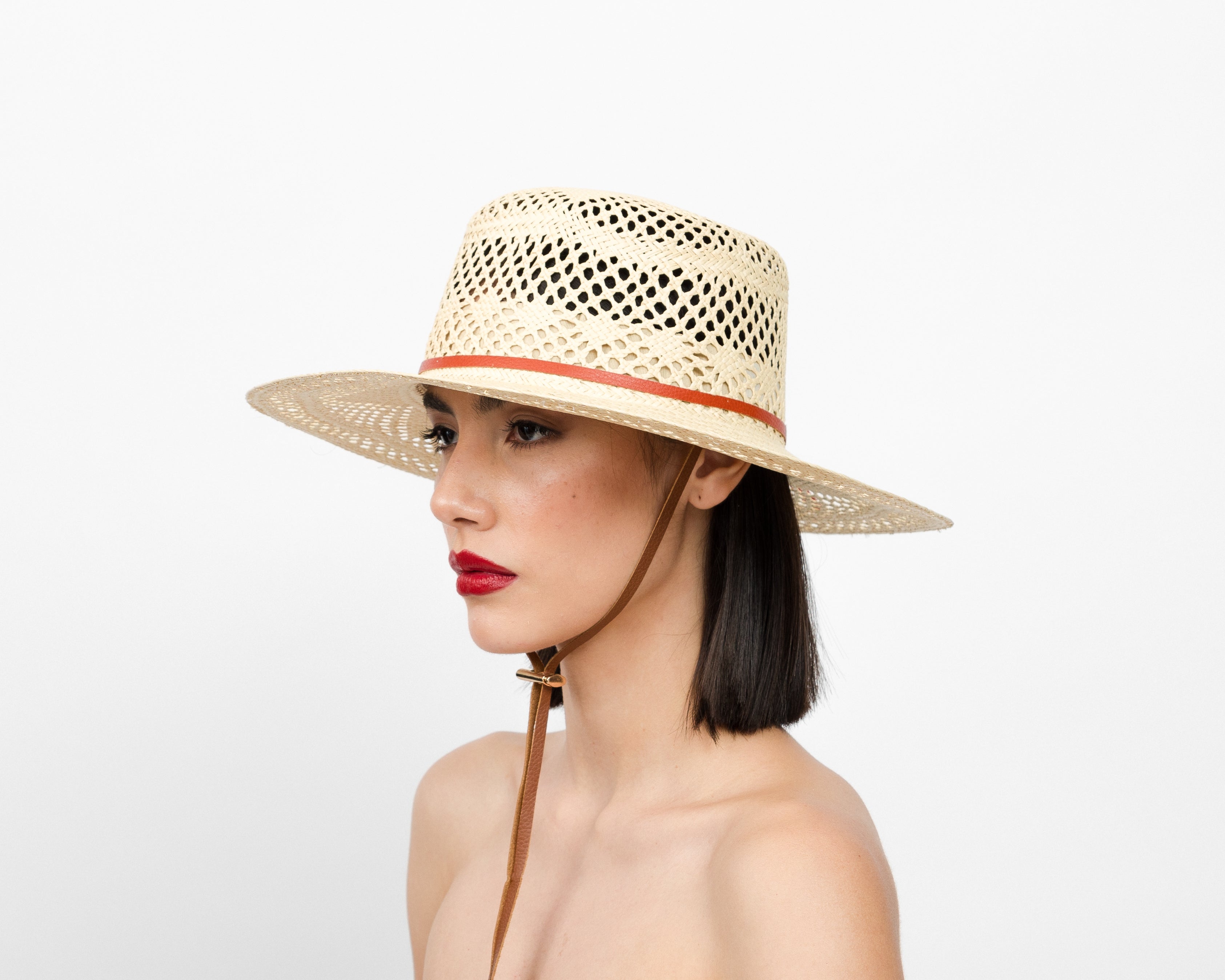 Chapeau en cuir Cordovan à tissage ouvert
