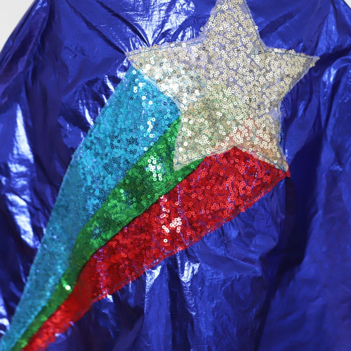 Déguisement cape à sequins réversible Super-héros Surprise Partie !