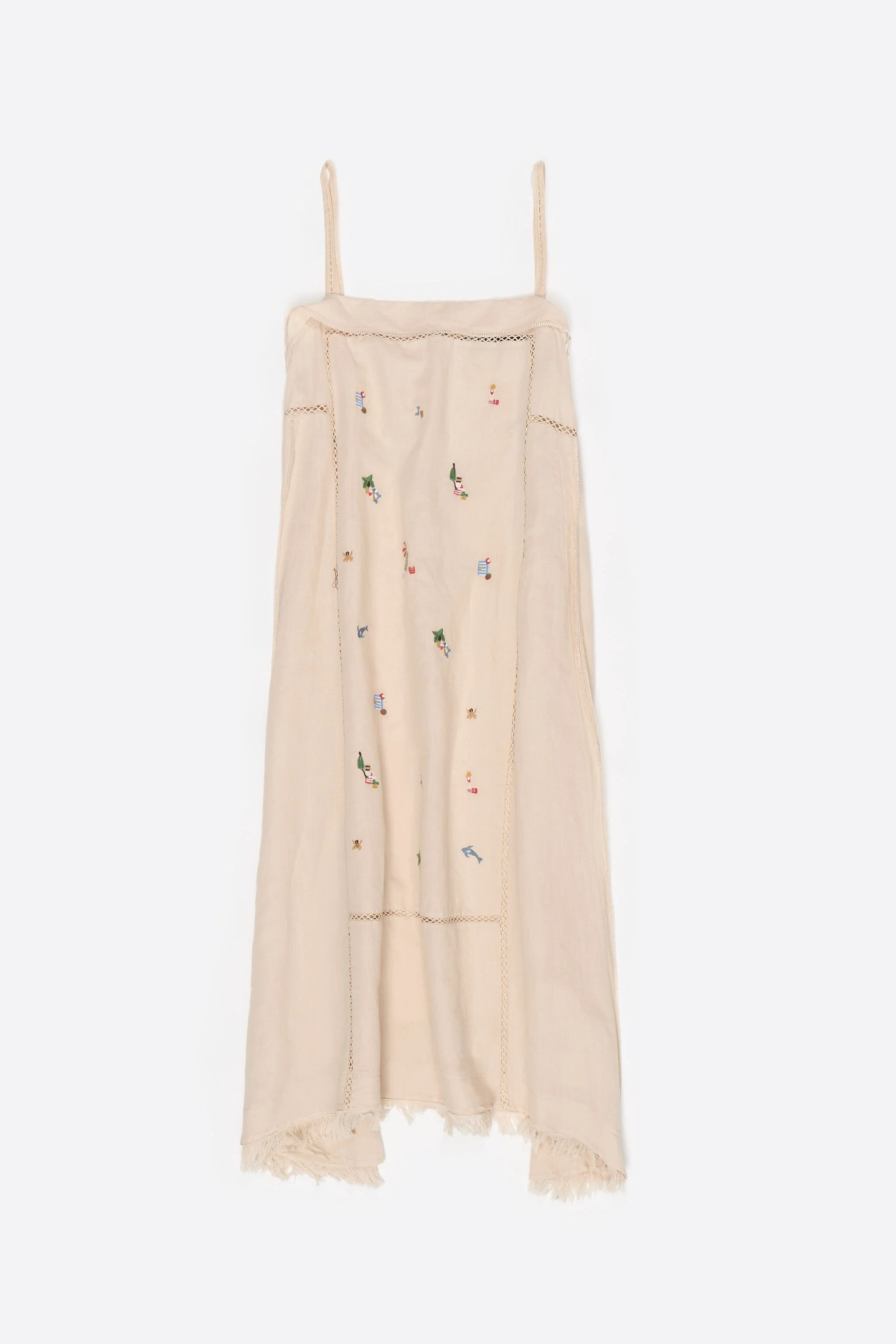 Vestido curto evasê em linho cor areia com bordado.