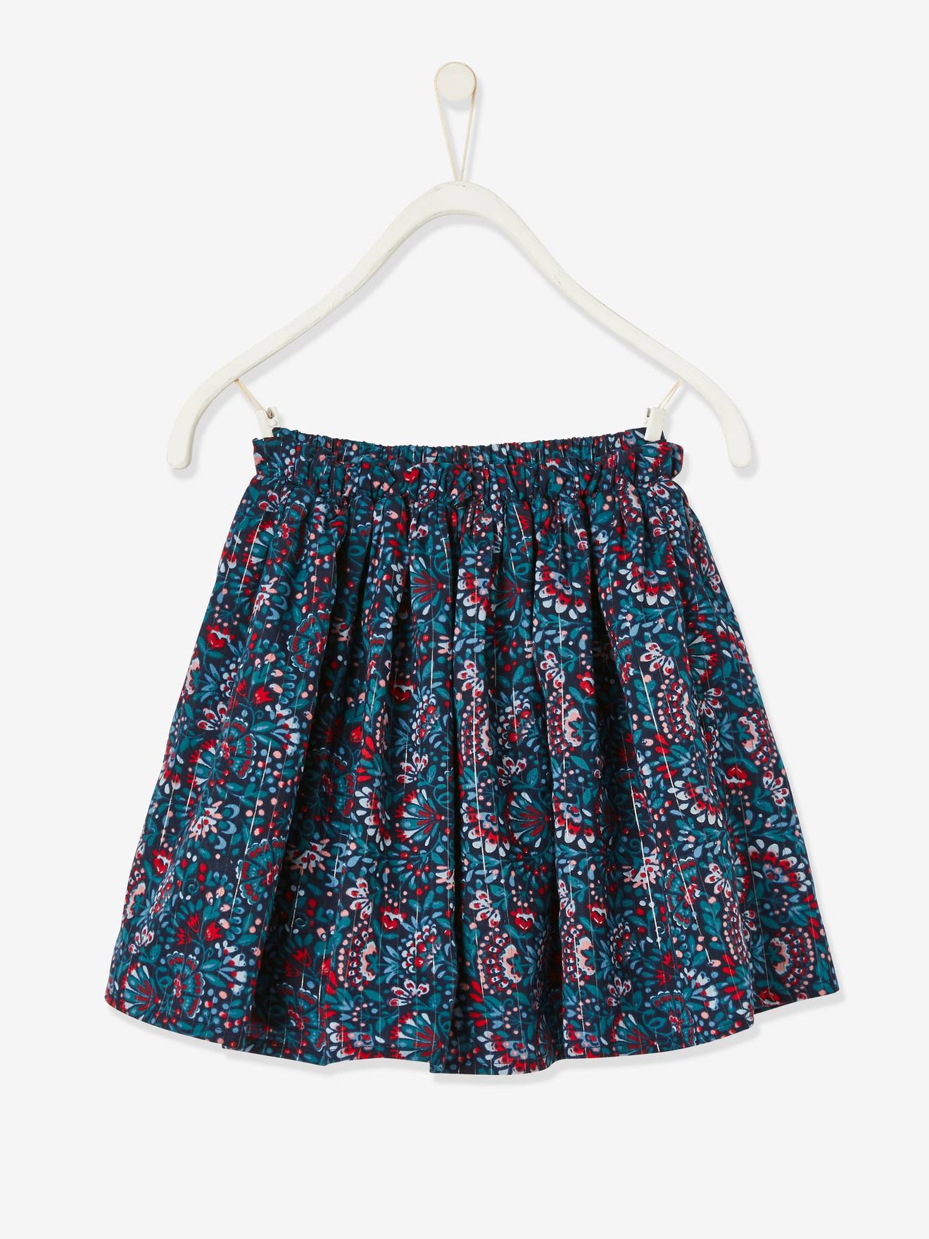 Saia estampada floral com detalhes em fios brilhantes, estampa azul vibrante para menina.