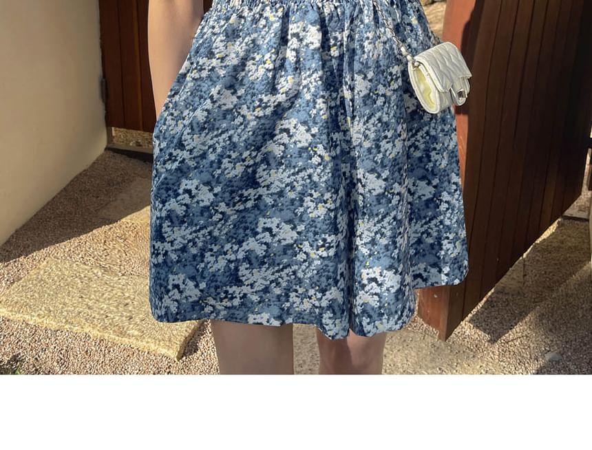 Coris - Romper met korte mouwen, off-shoulder bloemenprint en wijde pijpen