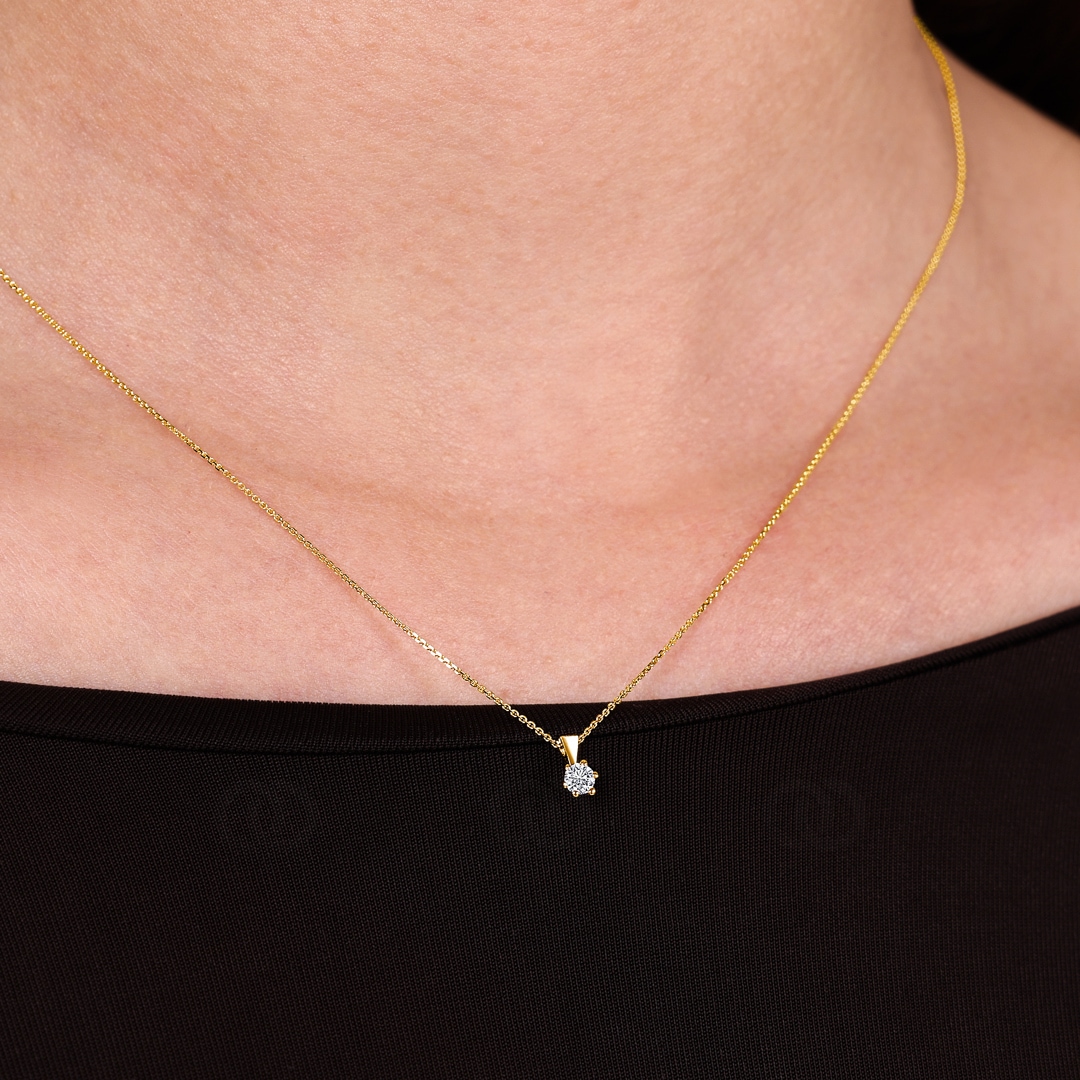 Collier mit Anhänger 750/18 K Gelbgold mit Diamant 0.10 ct H/si