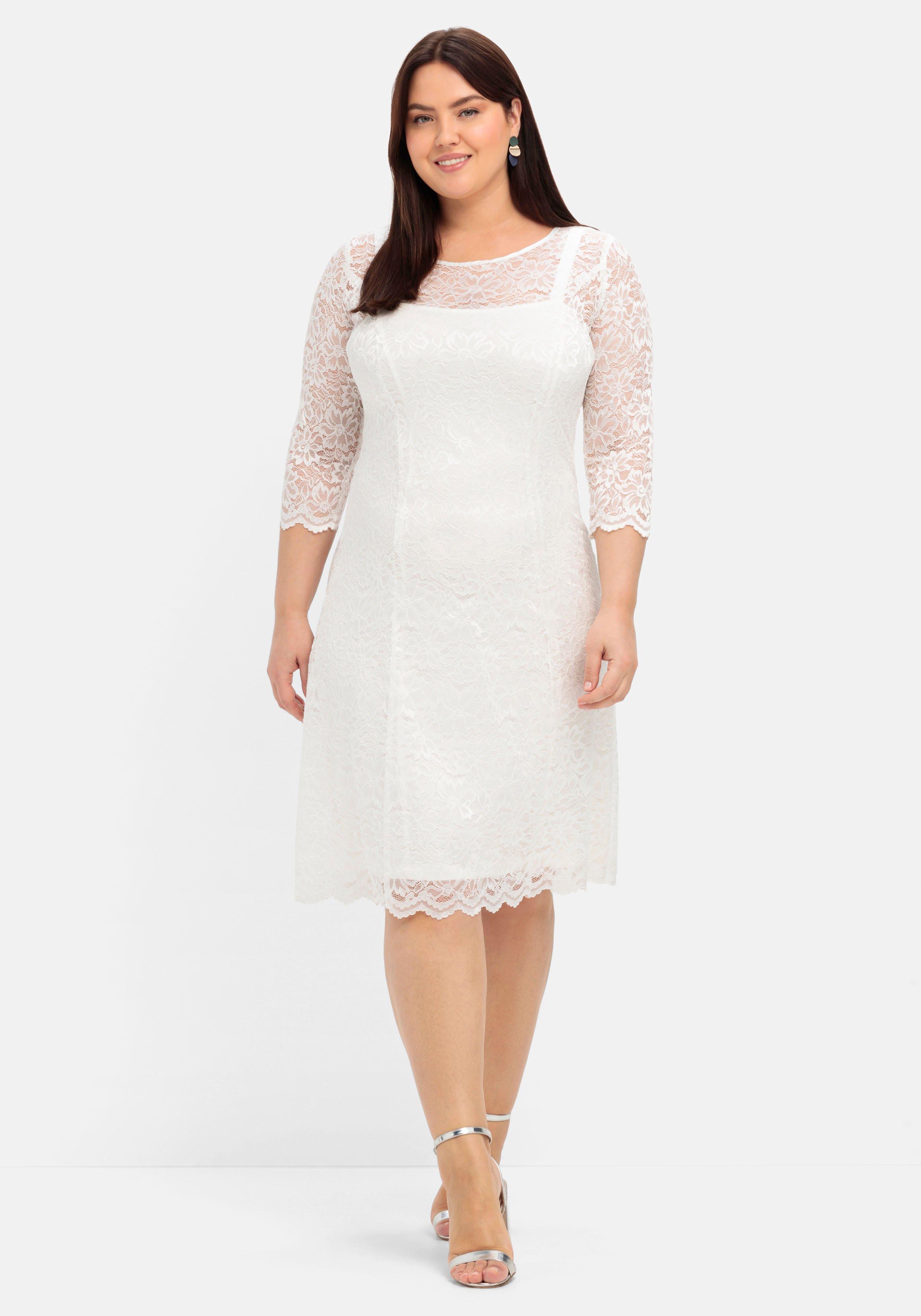 Spitzenkleid mit Wellensaum; knielang