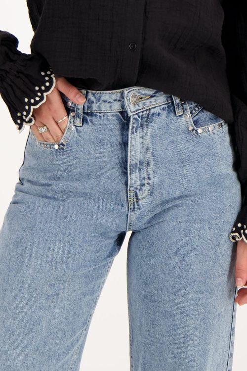 Blauwe jeans met wijde pijpen & studs