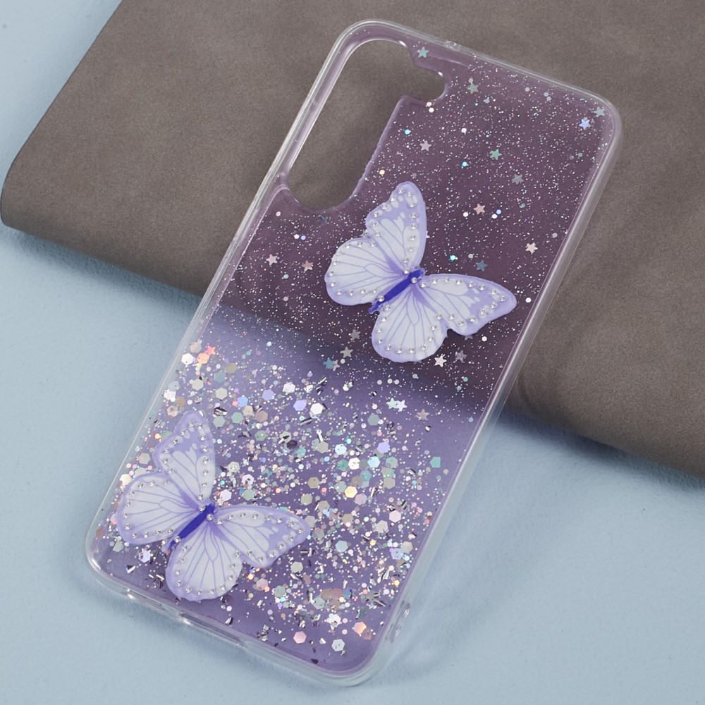 Samsung Galaxy S24 Hybrid Hardcase Schutzhülle im Glitzer Design Schmetterling - Lila / Transparent