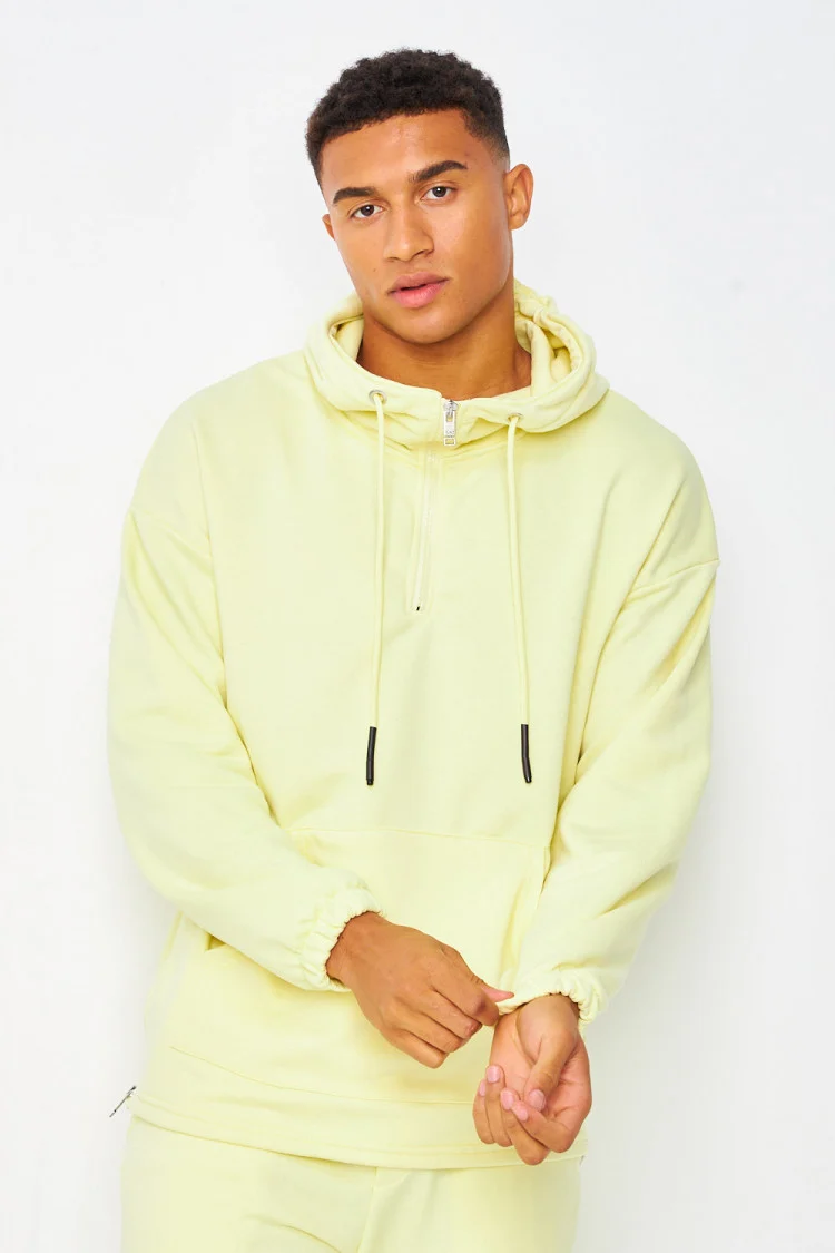 Sweat à capuche demi-zip jaune