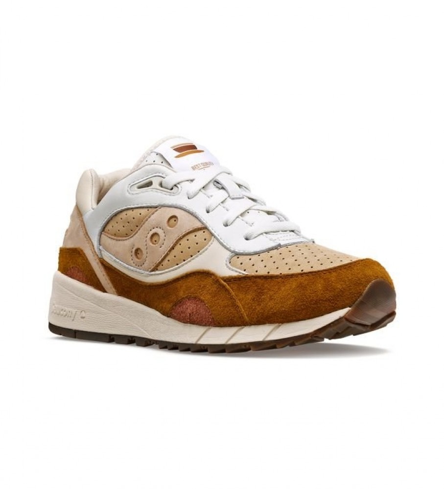Tênis Saucony Shadow 6000 de couro, marrom e branco.