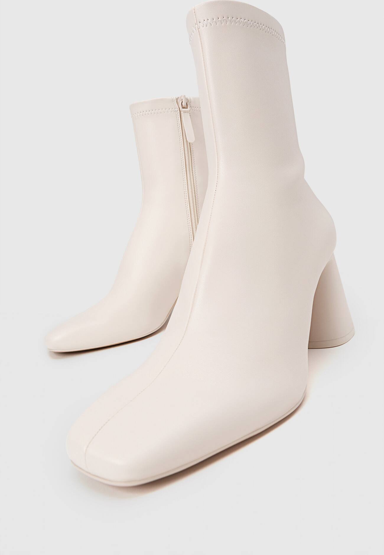 Botas de salto médio com pernas elásticas