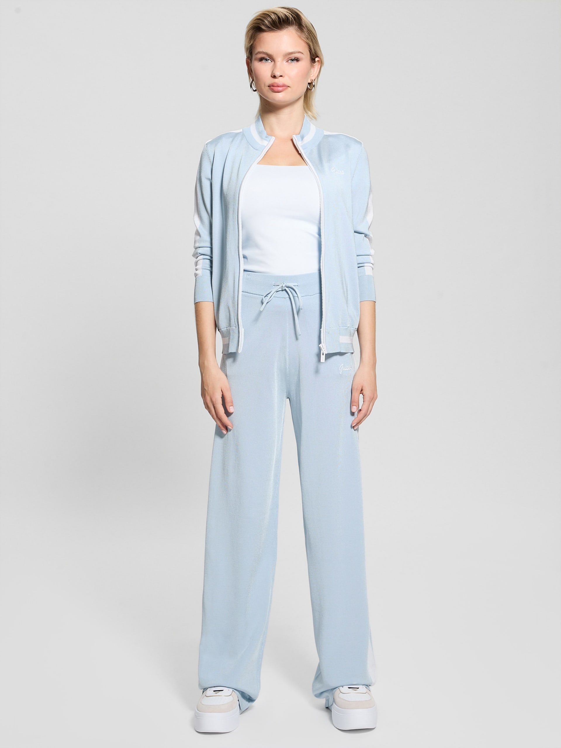 Calça de malha listrada