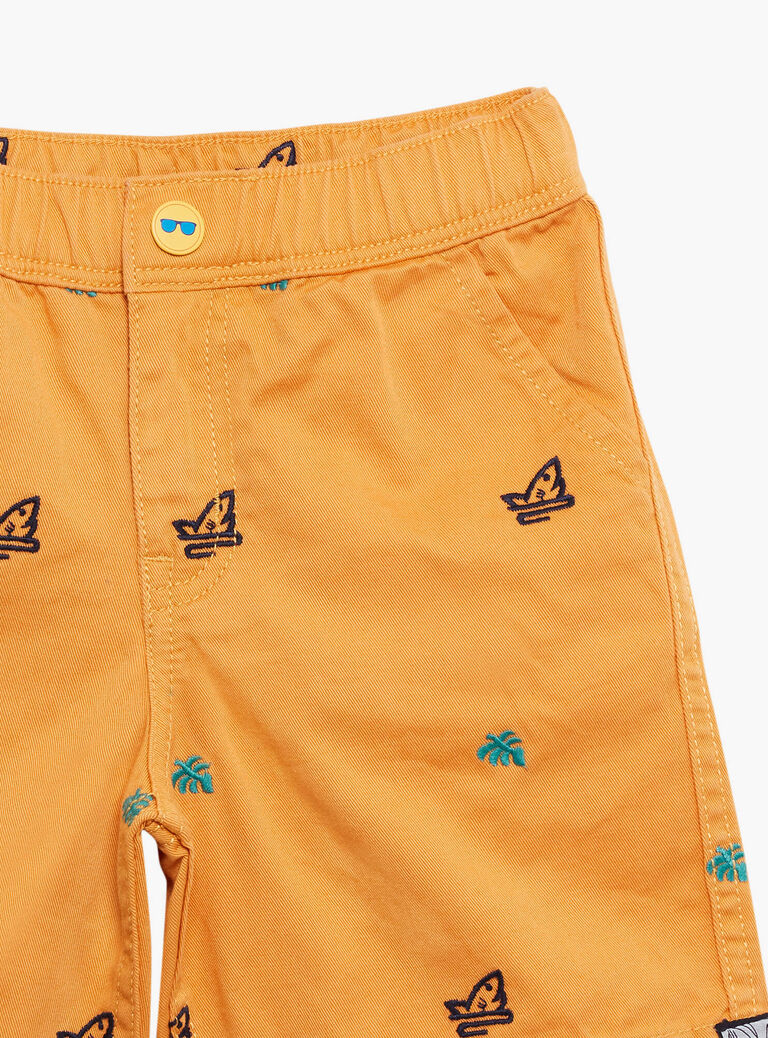 Short orange à imprimé requins et feuilles