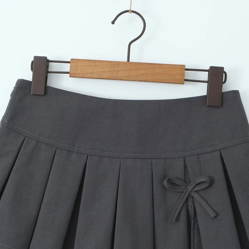 Omelia - Lage taille effen strik accent geplooide split mini A-lijn rok