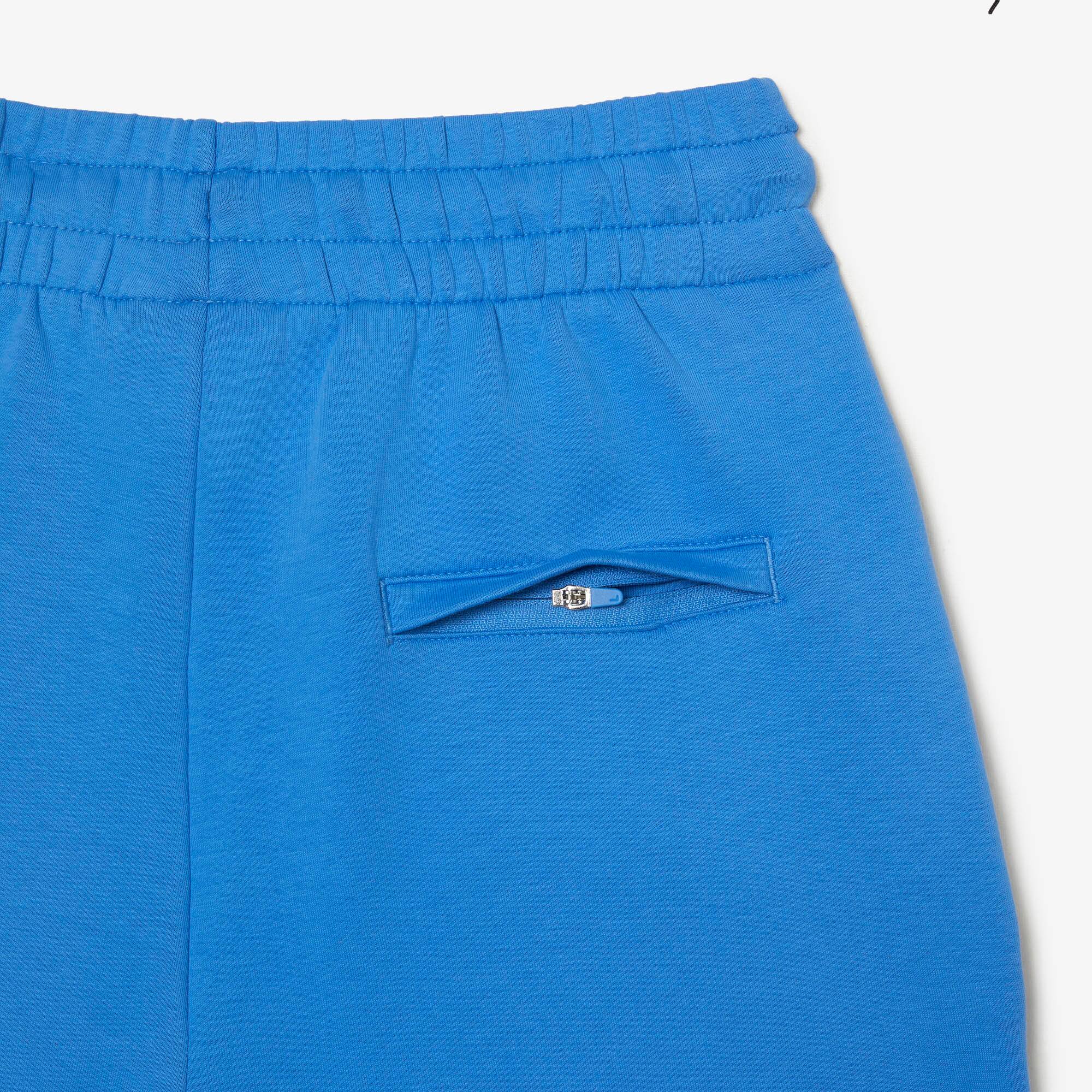 Pantalon de survêtement Jogger femme Lacoste en double-face Pantalons de survêtement - Bleu - Lacoste - Femme