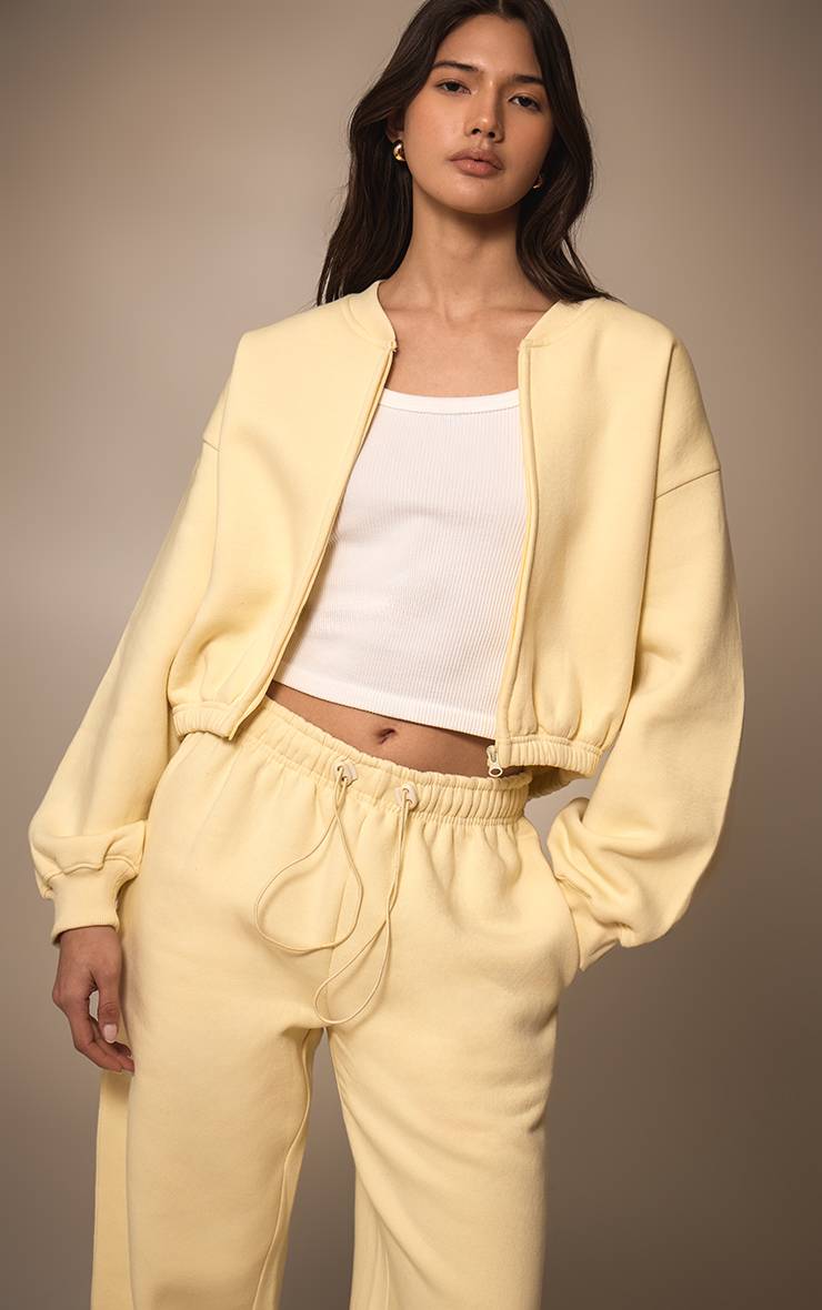 Pale Yellow Sweat-shirt Court Zippé Avec Cordon De Serrage À La Taille