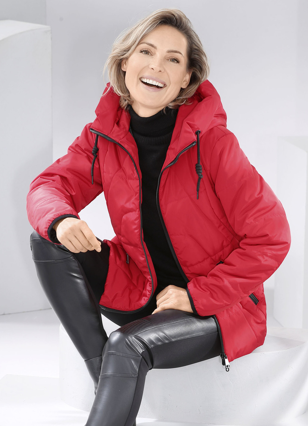 Jacke mit verlängertem Rückteil