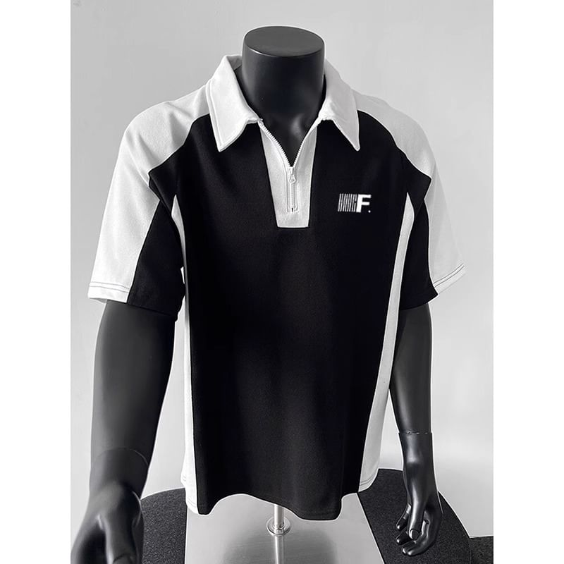 fluffush - Poloshirt met halve rits en tweekleurige letters op de elleboog