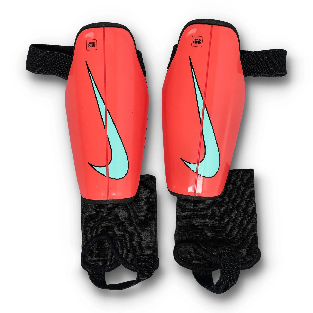 Caneleira Nike Charge Guard Criança