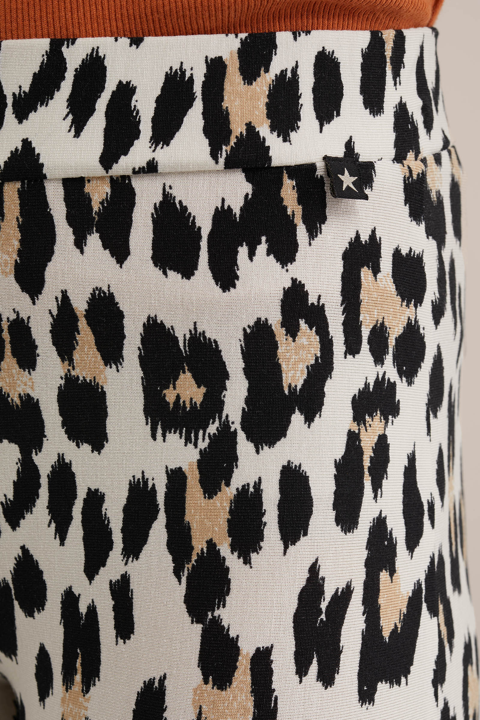 Meisjes flared legging met dessin WE Fashion Beige