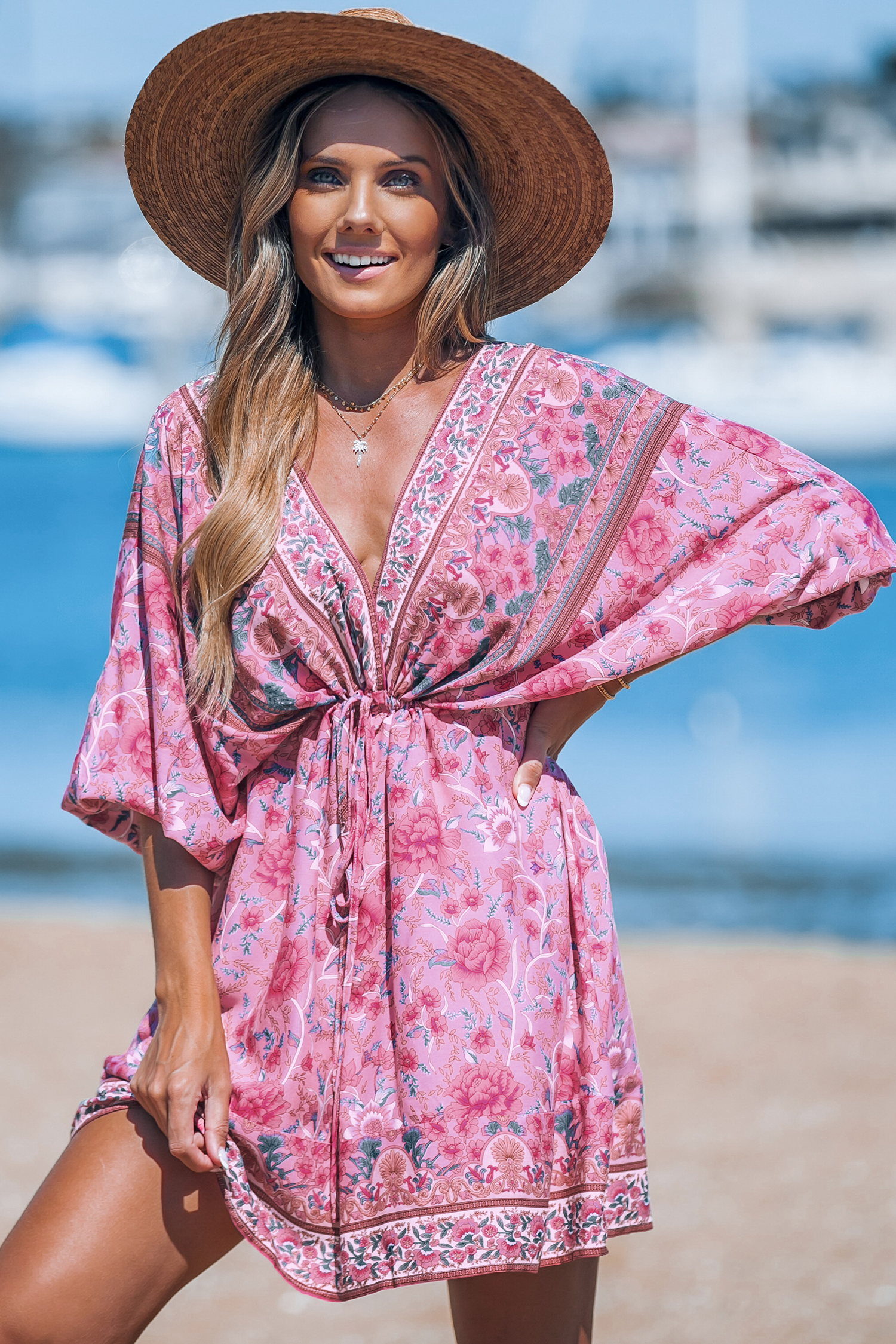 Robe mini avec manches blouson et col plongeant à fleurs roses