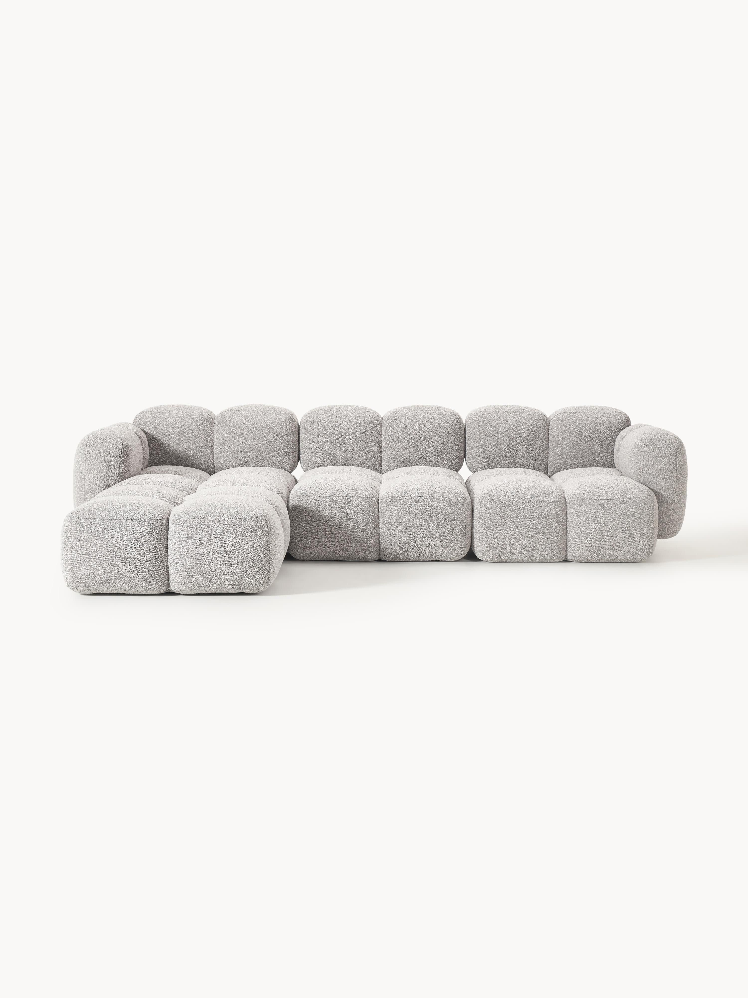 Modulaire bank Tayla (4-zits) van bouclé met poef (links/rechts)