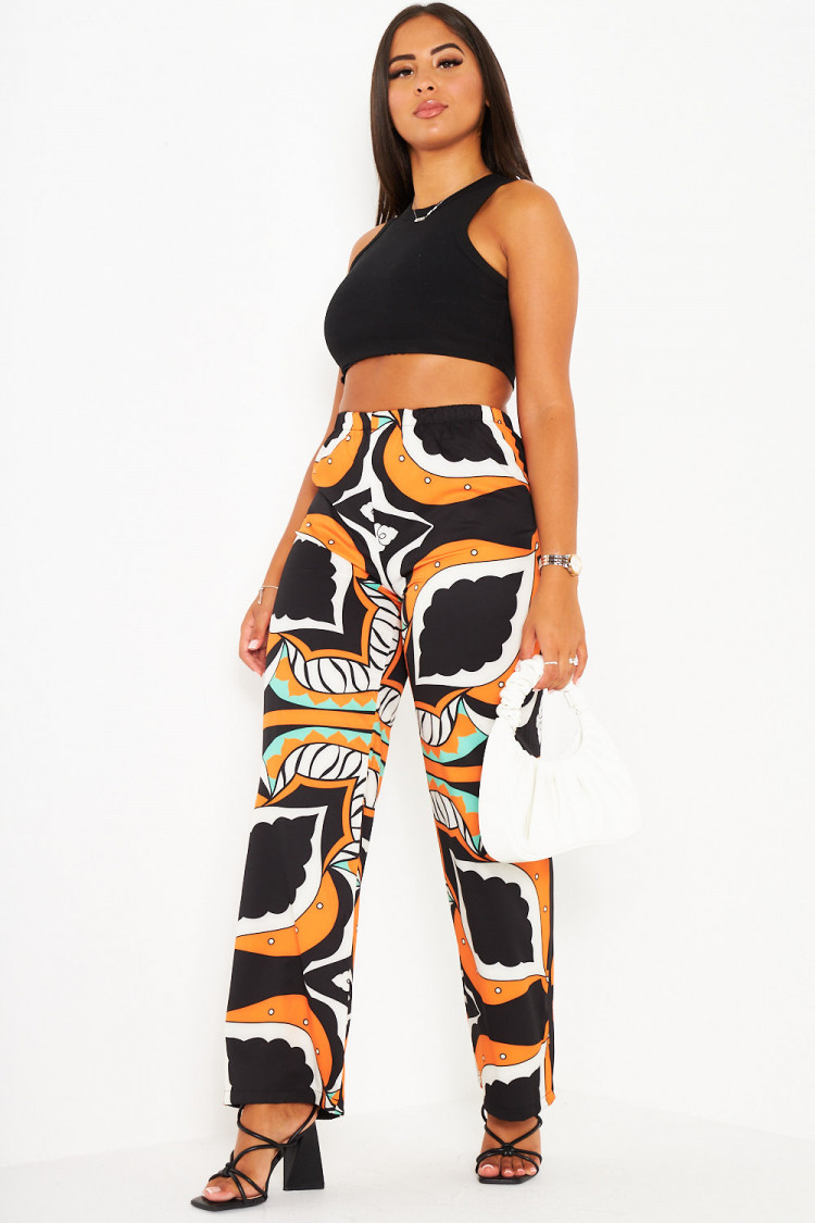 Pantalon orange large et baroque