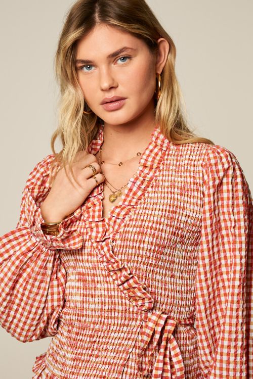 Oranje geruite smock top