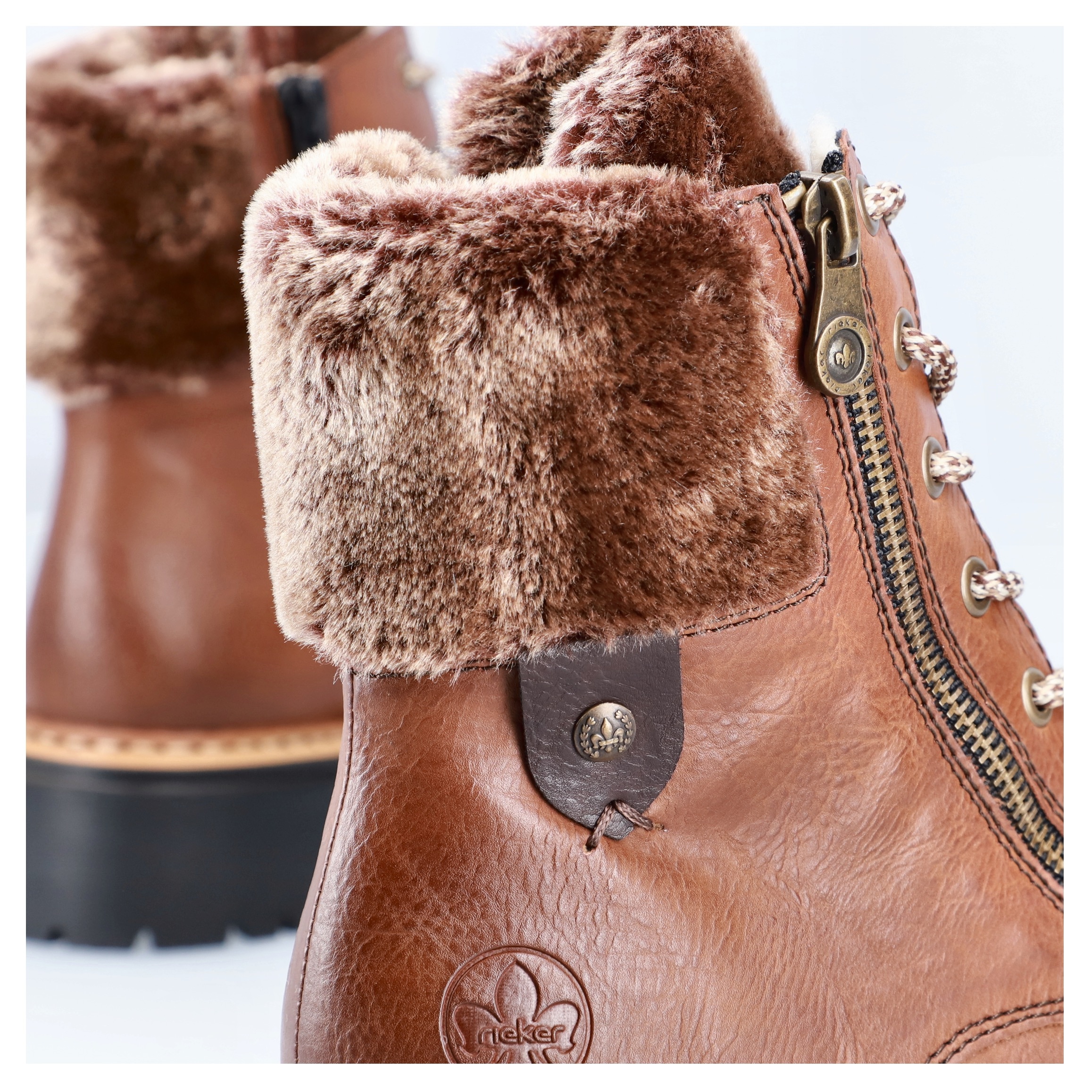 Rieker Winterstiefelette  mit Fellimitat am Schaft