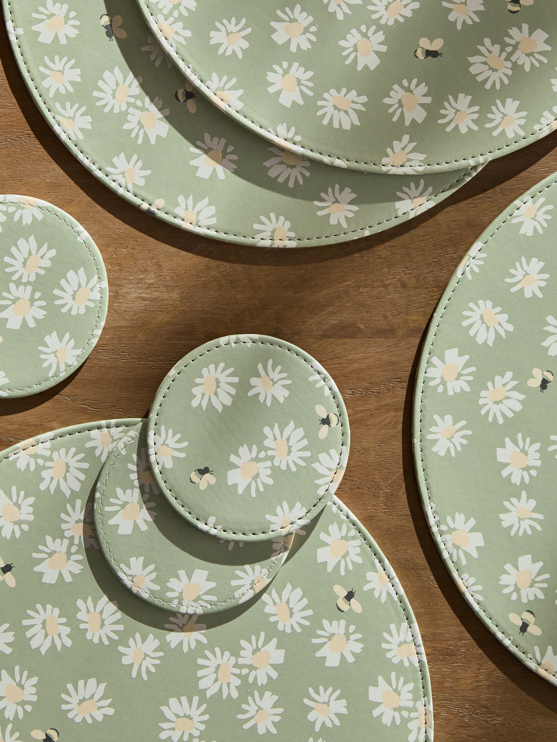 Set van 4 bedrukte imitatieleren placemats en onderzetters