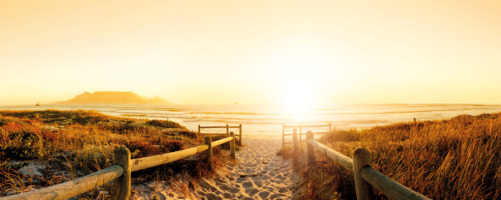 Leinwandbild SONNENUNTERGANG AM STRAND - grün-gelb - 100x40 cm