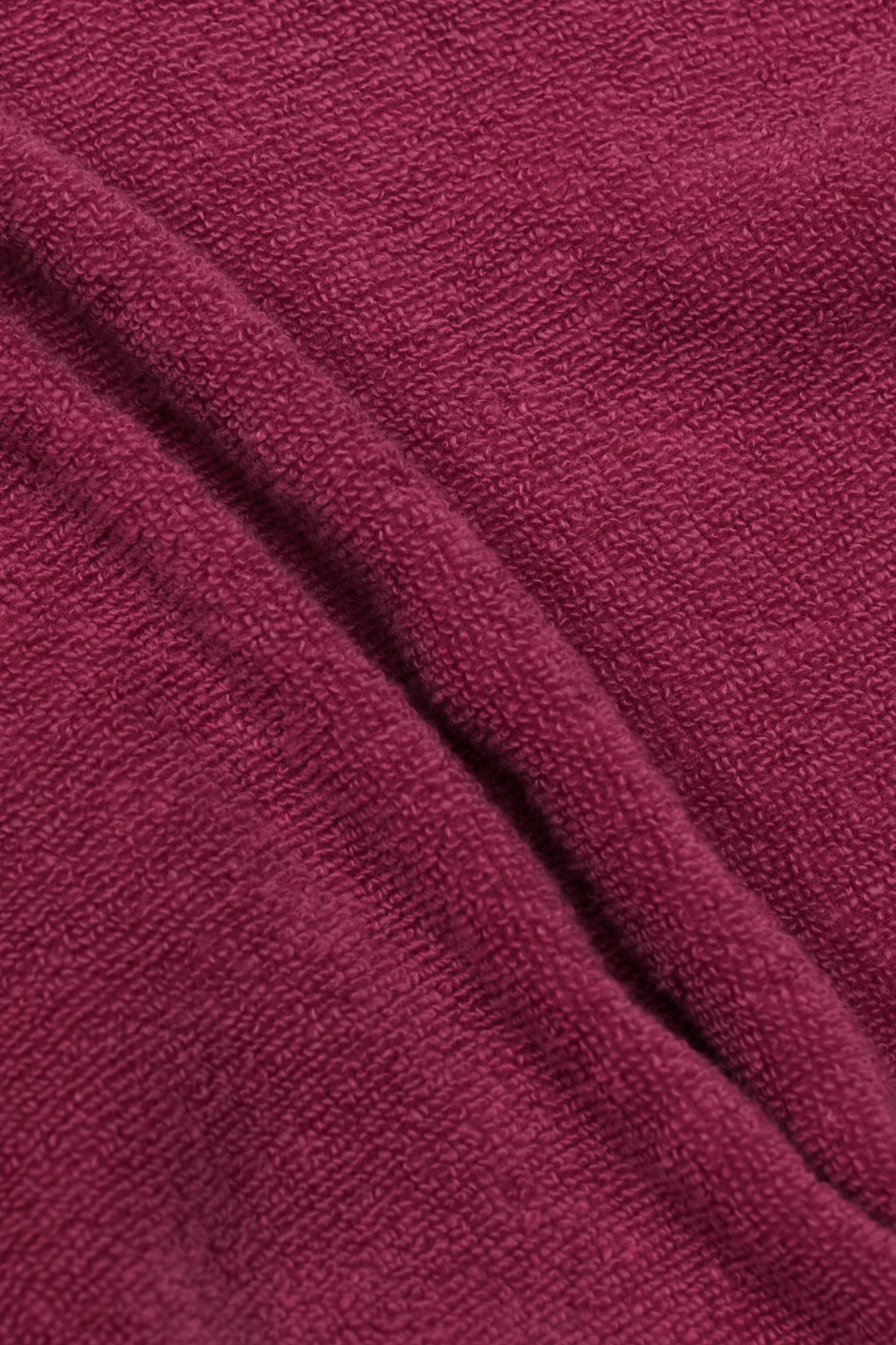 Peignoir en tissu éponge à doublure rayée