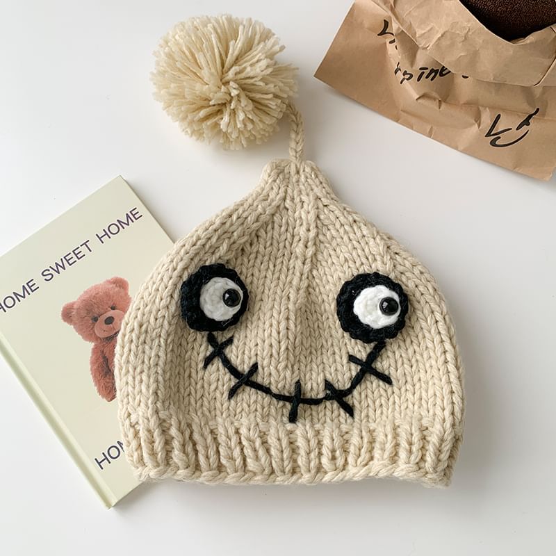 Amandier - Monster Pom Pom gebreide muts