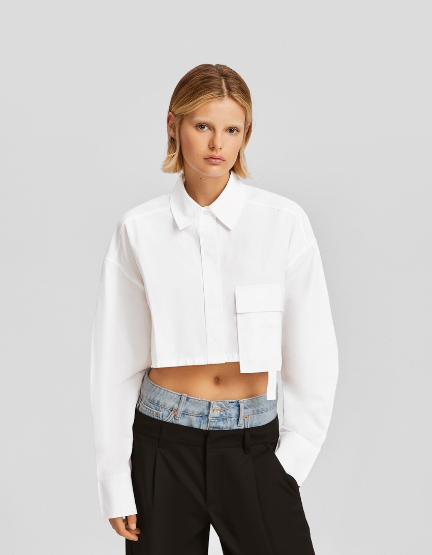 Camisa cropped de popeline de manga comprida com alças.