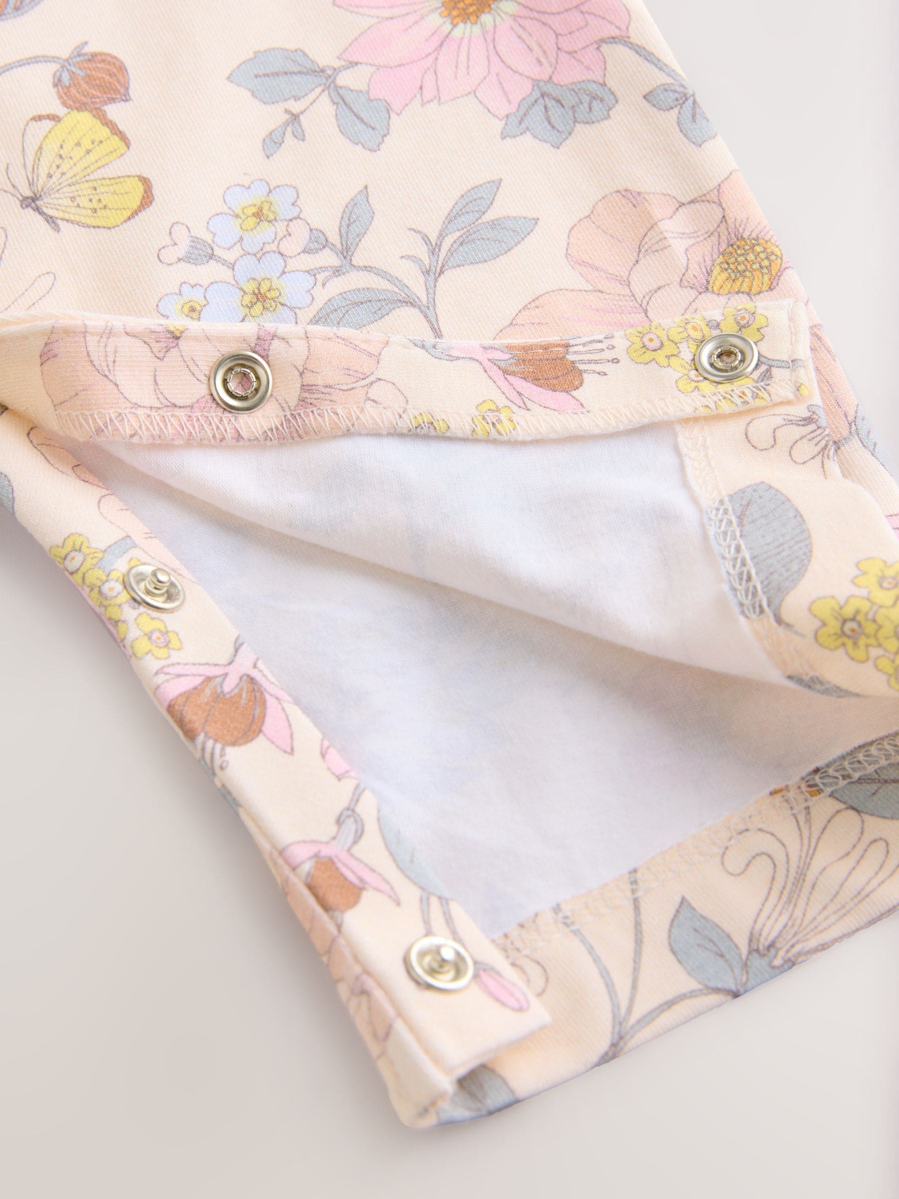 Roze bloemen - Babyromper met lange pijpen (0 mnd - 3 jr)