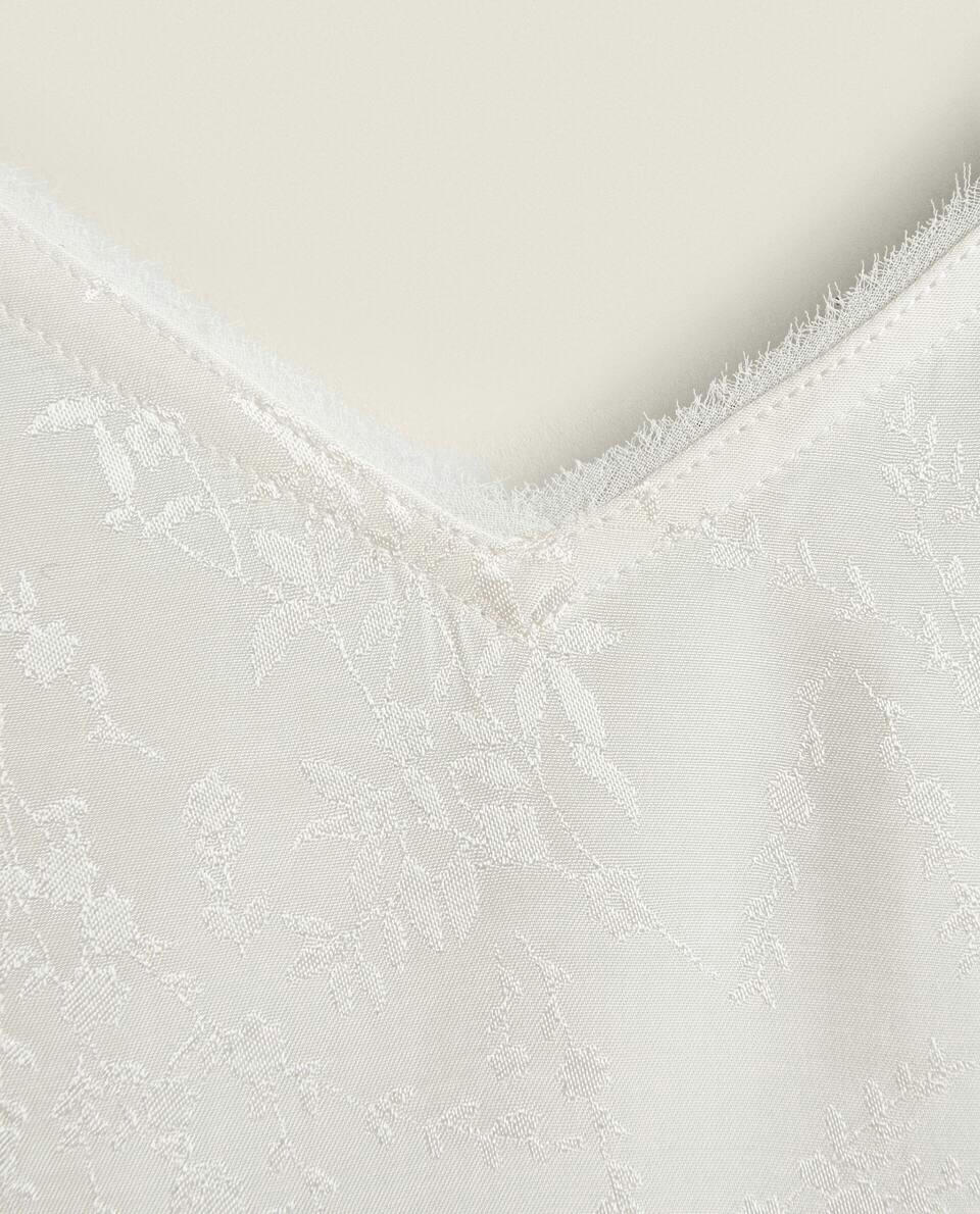 Blusa jacquard com estampa floral
