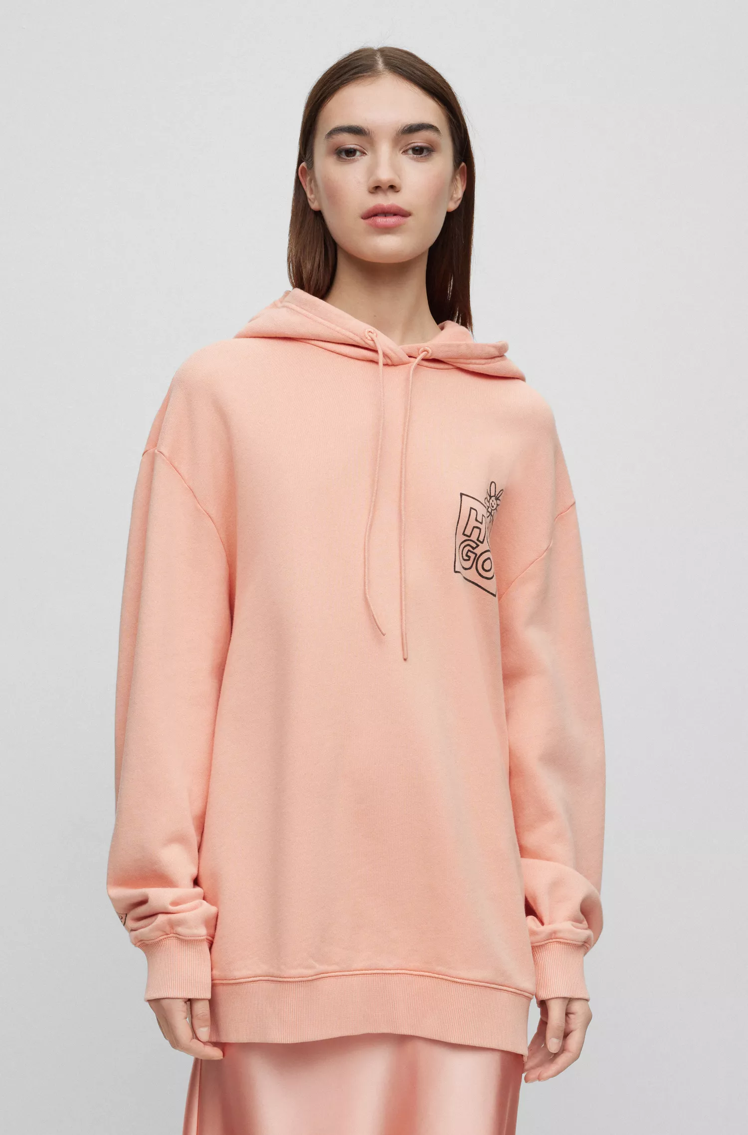 Moletom HUGO vermelho em algodão felpudo com estampas sazonais.